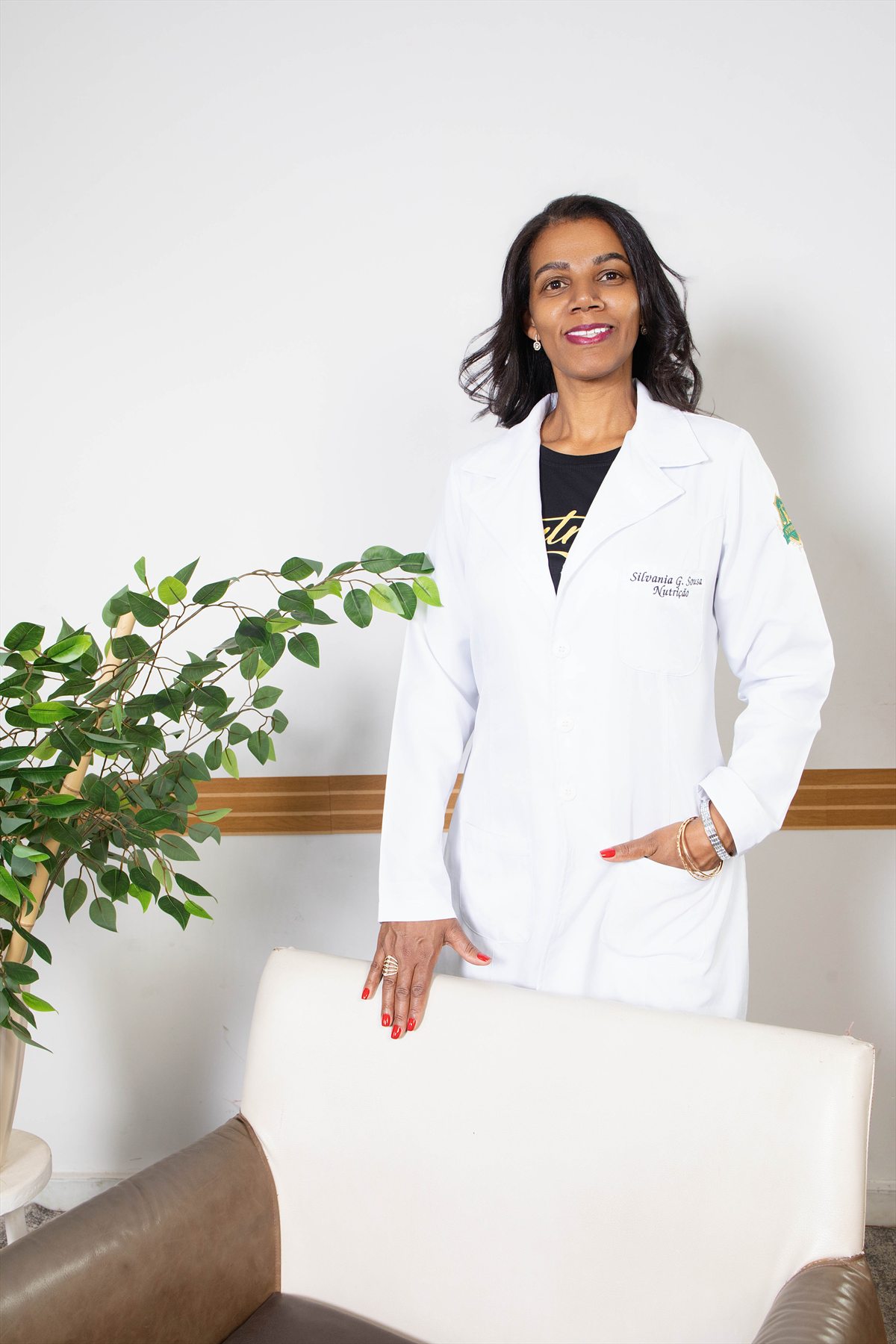 Nutricionista em retrato profissional com jaleco